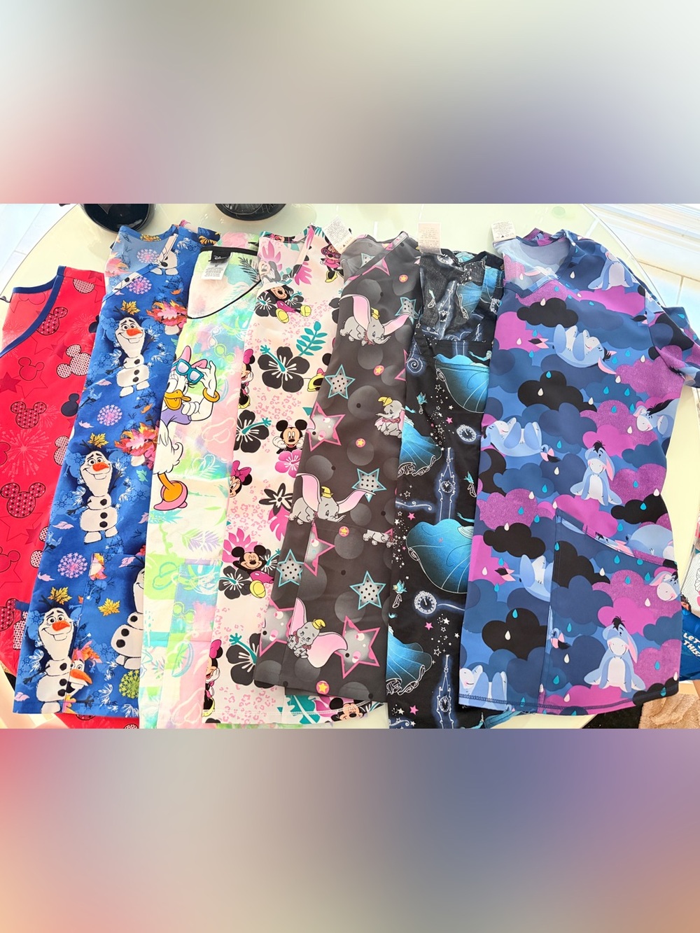 Lot of 7 medium Disney scrub tops